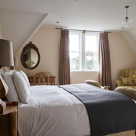 לינה וארוחת בוקר צ'לטנהם Cotswold Grange מראה חיצוני תמונה A bedroom at The Pig