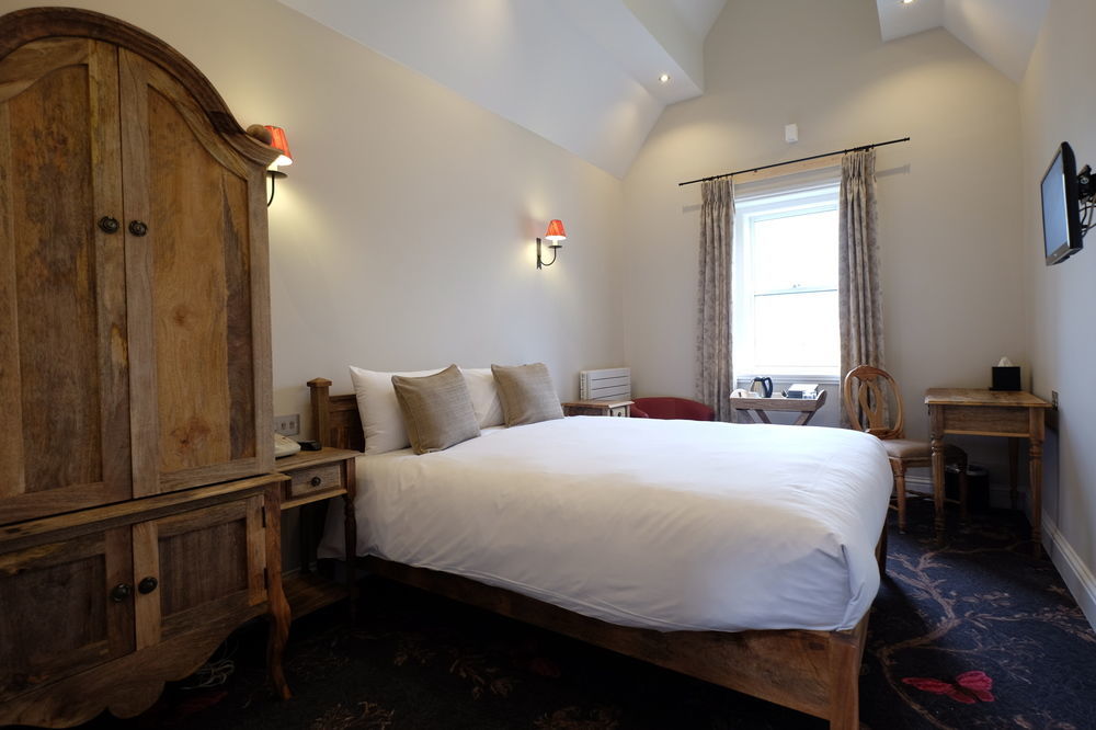 לינה וארוחת בוקר צ'לטנהם Cotswold Grange מראה חיצוני תמונה A room at the hotel