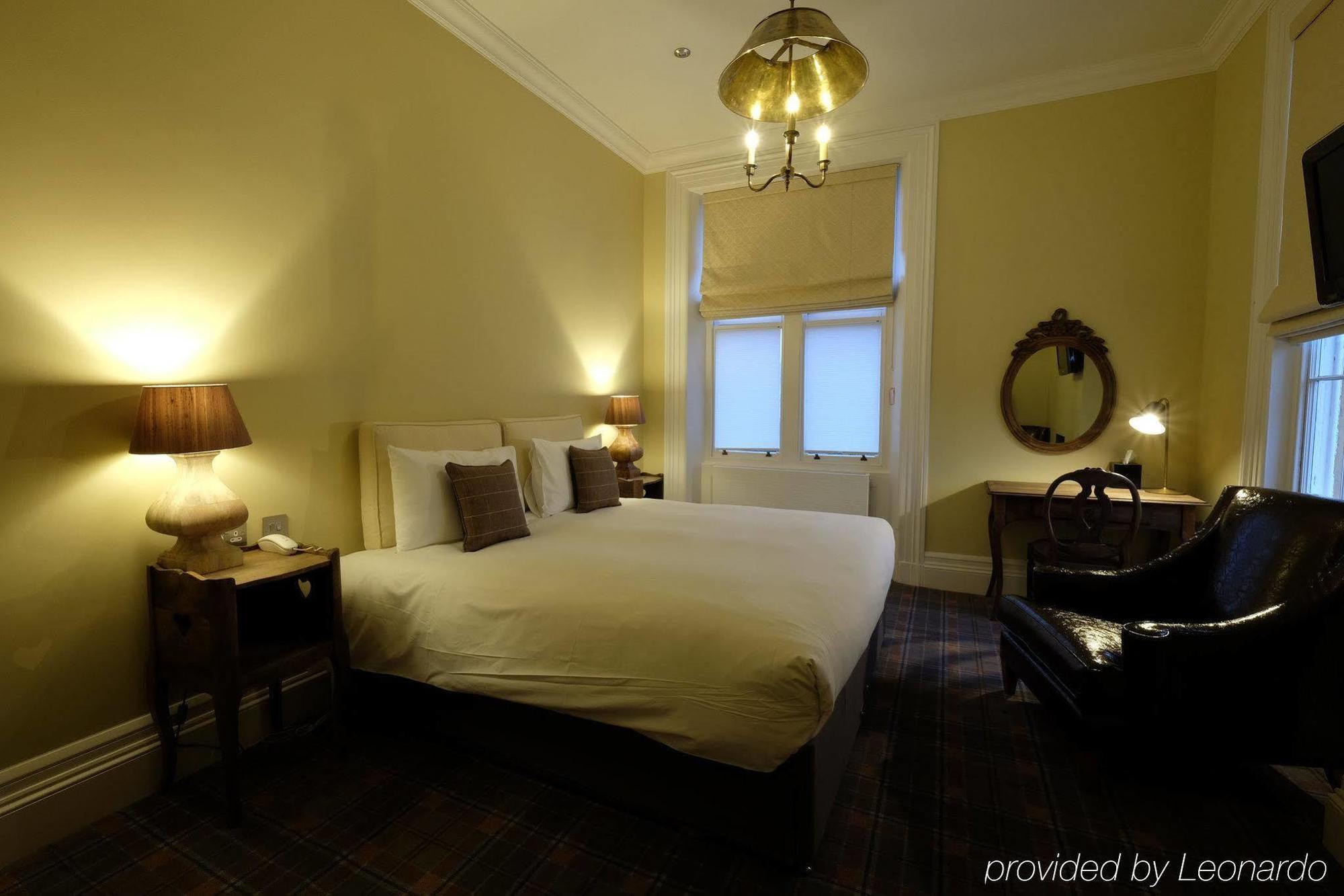 לינה וארוחת בוקר צ'לטנהם Cotswold Grange מראה חיצוני תמונה A room at the hotel
