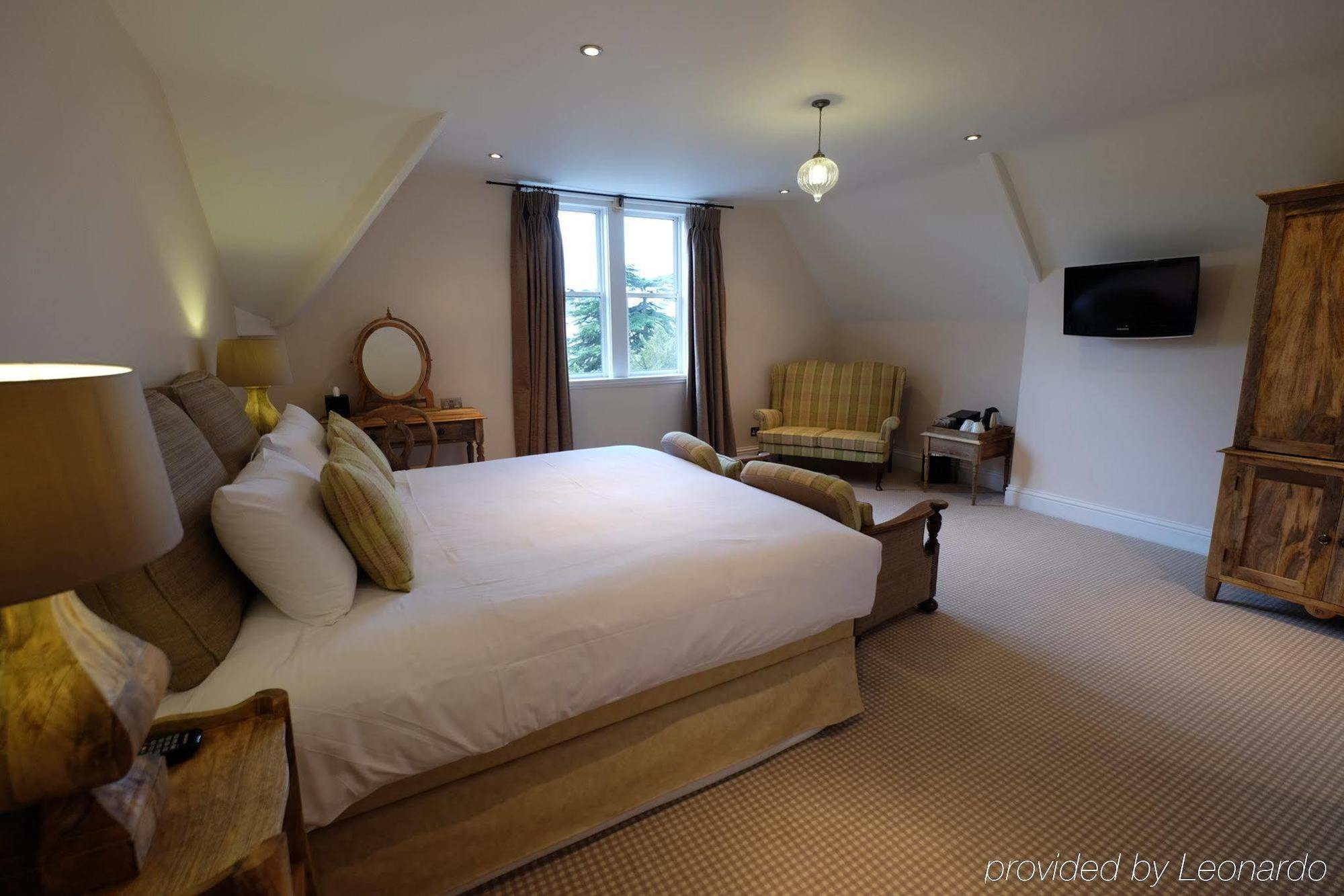 לינה וארוחת בוקר צ'לטנהם Cotswold Grange מראה חיצוני תמונה A bedroom at The Old parsonage